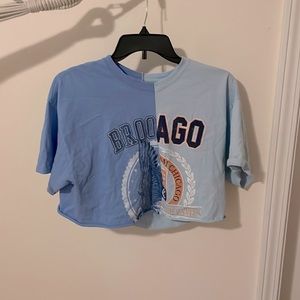 half pale blue, half indigo shirt, full tilt with yellow details, size medium